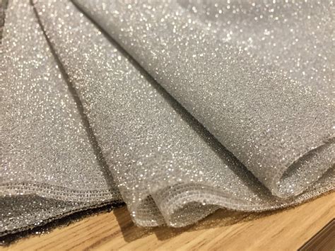 white and silver metallic fabric|fabric with metallic threads.